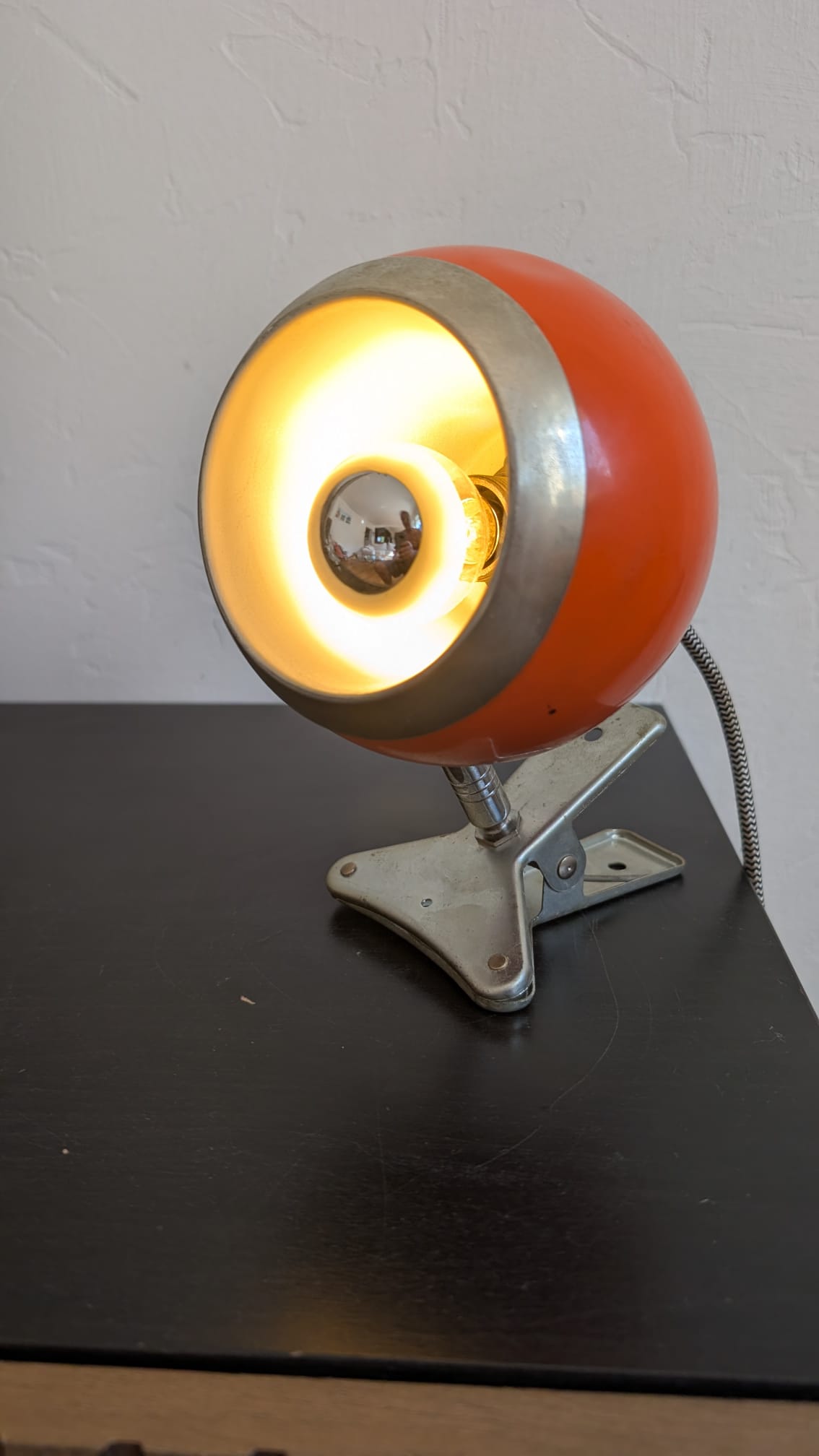 Lampe eyeball orange sur pince année 70